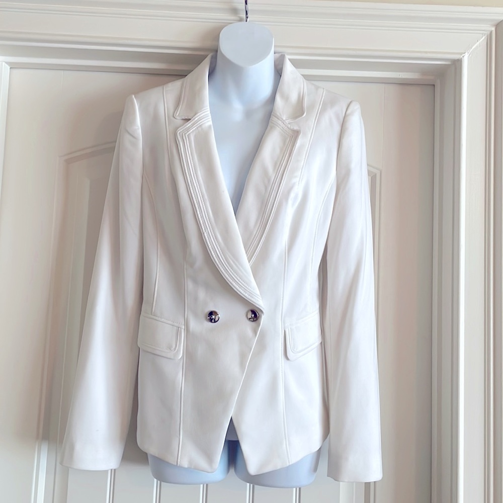 White Blazer with Stitched detailing on Lapel and Pockets. Chrome double Buttons